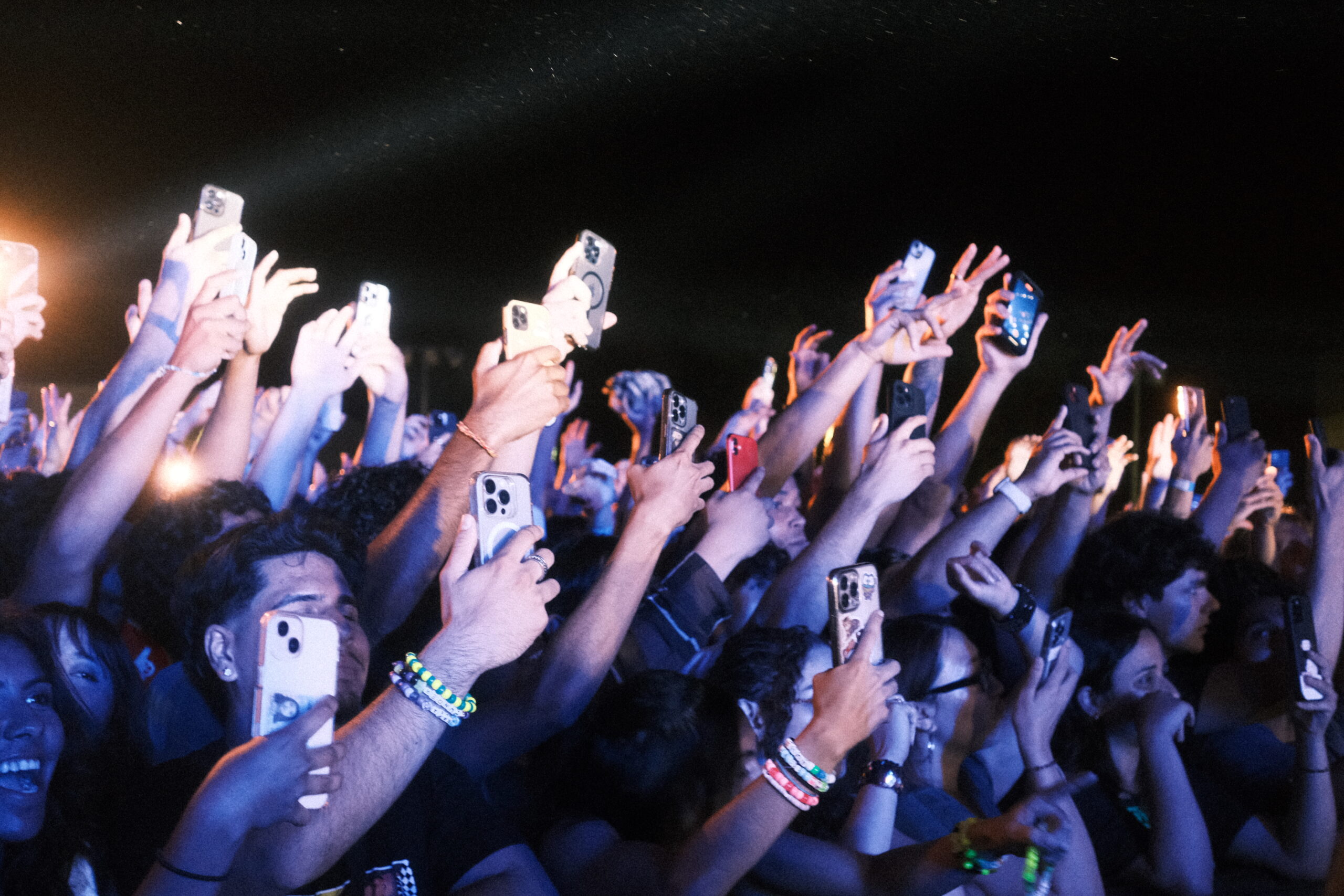 Concertgoers capture the performances with their phones during Bronco Fusion. Bryan Doan | The Poly Post